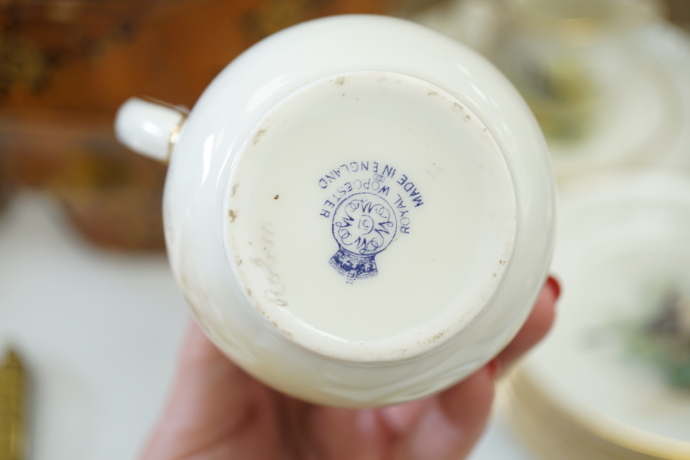 A Royal Worcester titled bird part tea set painted by W Powell
